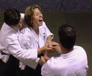 Partially sighted melodie practices Aikido