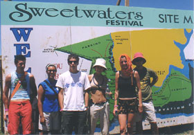 Festival goers in front of Sweetwaters sign